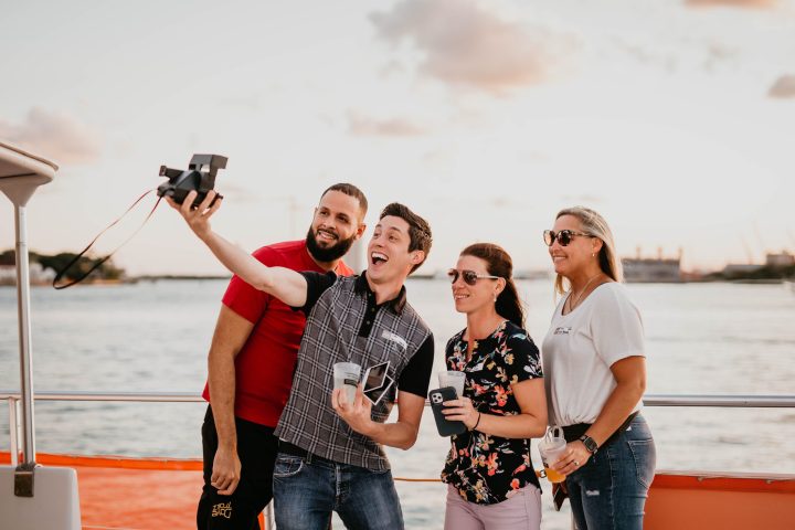 a group of people standing in the water