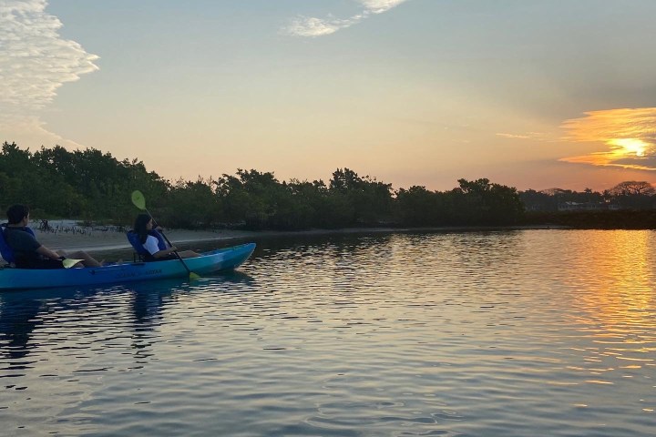 a small boat in a body of water